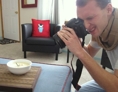 A photo of Luke photographing soup